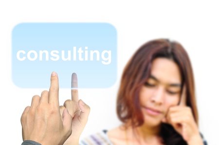 hand pressing consulting button on a touch screen interface の写真素材