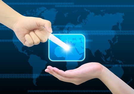 hand pushing a button on a touch screen interfaceの写真素材