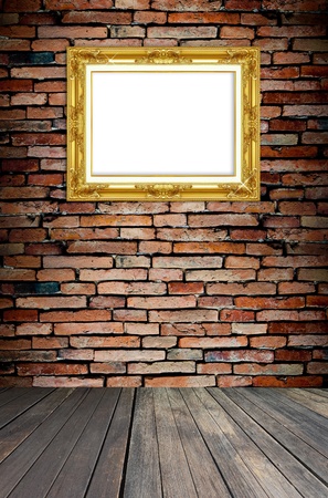 golden frame on old brick wallの写真素材