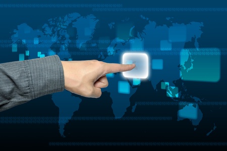 businessman hand pushing a button on a touch screen interfaceの写真素材