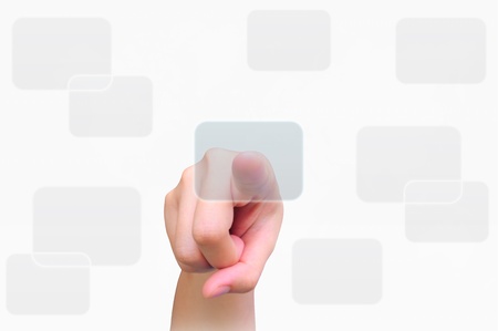 hand pushing a button on a touch screen interfaceの写真素材