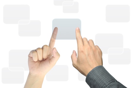businessman hand pushing a button on a touch screen interfaceの写真素材