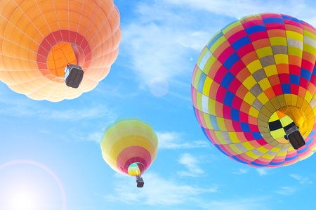 colorful hot air balloon with beautiful blue sky and cloudの写真素材