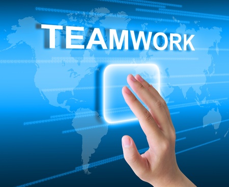 hand pressing teamwork button on a touch screen interface の写真素材