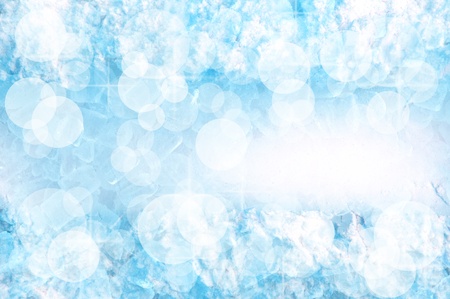 abstract ice cube and snow in blue light backgroundの写真素材