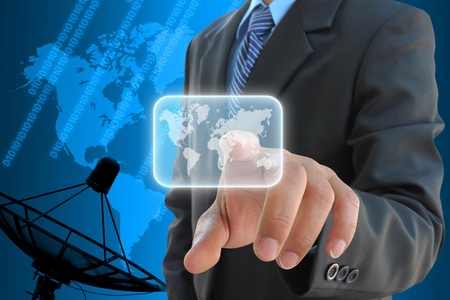 businessman hand pushing button on a touch screen interfaceの写真素材