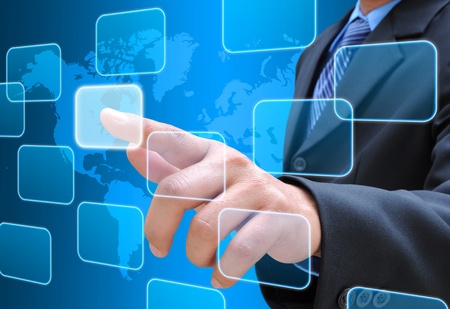 businessman hand pushing button on a touch screen interfaceの写真素材