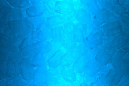 abstract ice cube in blue light backgroundの写真素材