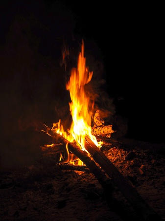 flames of a campfire in the nightの写真素材