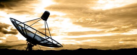 satellite dish antennas under skyの写真素材