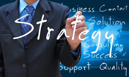 businessman hand writing strategyの写真素材