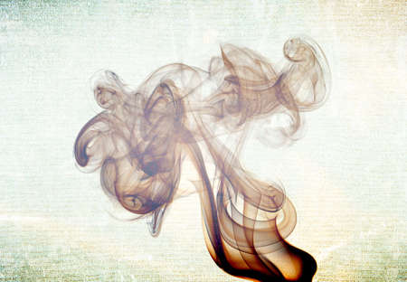 Abstract glowing of smoke isolated on blackの写真素材