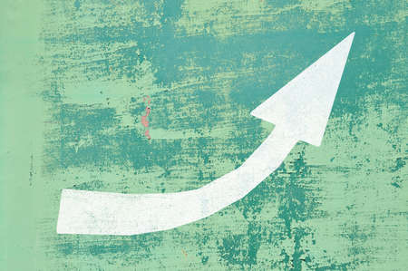 abstract the arrow on old grunge wallの写真素材