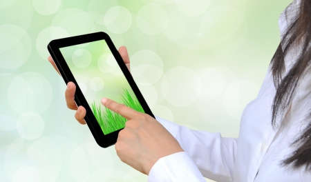 hand pressing touch pad PCの写真素材