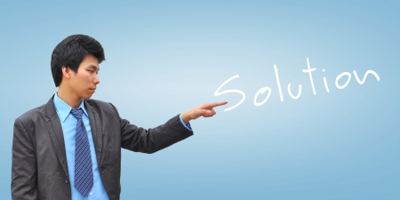 businessman hand pushing solutionの写真素材