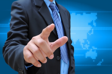 businessman hand pushing on a touch screen interface の写真素材