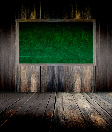 abstract the green blackboard on grunge wallの写真素材