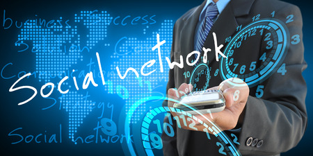businessman hand holding social networkの写真素材