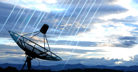 satellite dish antennas under blue skyの写真素材