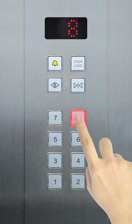 hand press 8 floor in elevatorの写真素材