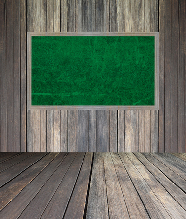 abstract the green blackboard on grunge wallの写真素材