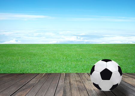 soccer ball, field and beautiful blue skyの写真素材