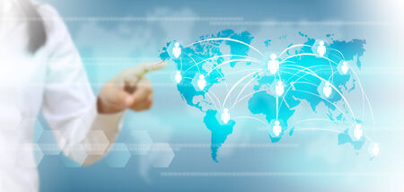 hand pushing social network button on a touch screen interfaceの写真素材