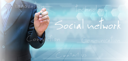 businessman hand writing social networkの写真素材