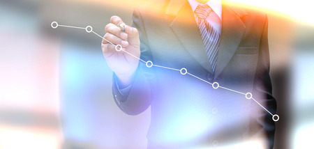 businessman hand writing a business graph

の写真素材