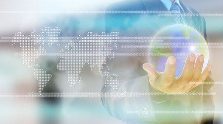 businessman hand holding a worldの写真素材