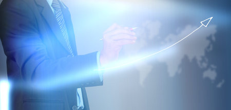 businessman hand writing a business graphの写真素材