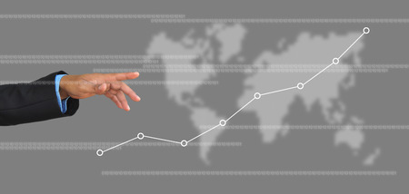 businessman hand writing a business graphの写真素材