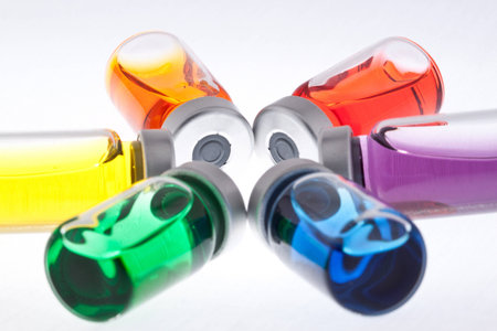 Colorful wheel of injection vials ready for use.