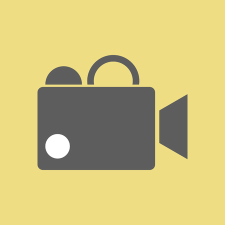 Video camera icon on the yellow background. Cinema. Vector illustrationのイラスト素材