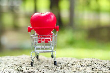 trolley with heart, idea for shopping using as business backgroundの写真素材