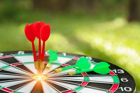 dartboard target center with arrows, idea of financial and business goal, using as backgroundの写真素材