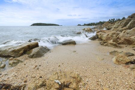 close up image of big wave on beautiful beach. tropical sea in Thailandの写真素材