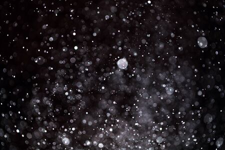 abstract background from spray water, similar to star or galaxy using as wallpaperの写真素材