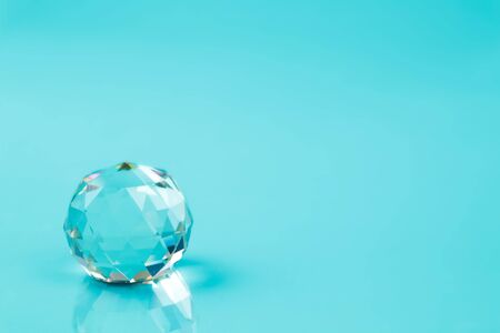 crystal ball on blue background (creative concept)の写真素材