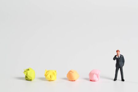 businessman with colorful paper (idea for saving paper)の写真素材