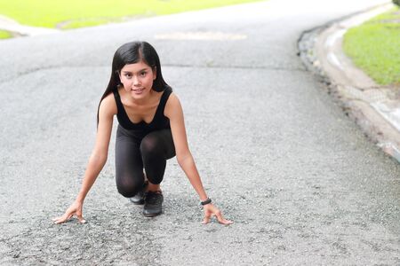 sport runner girl on startの写真素材