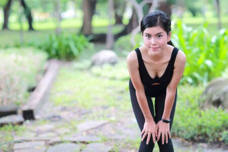 young healthy and sporty woman do yoga stretching outdoorの写真素材
