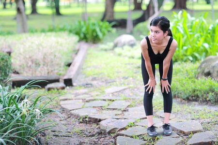 young healthy and sporty woman do yoga stretching outdoorの写真素材