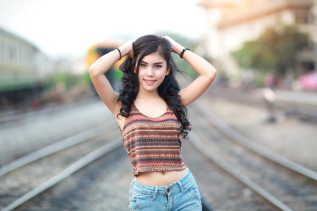 young traveler woman waiting for train