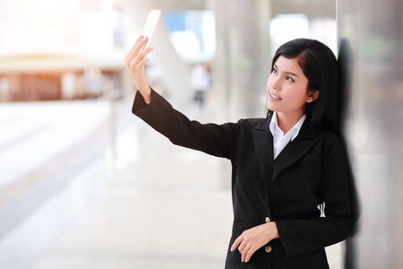 businesswoman do self portraitの写真素材