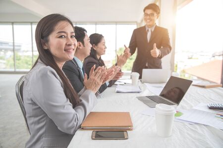 businesspeople meeting and discussing with graph and chart and showing successful result using as background (concept of successful and achievement)の写真素材
