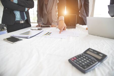 businesspeople meeting and discussing with graph and chart and showing successful result using as background (concept of successful and achievement)の写真素材