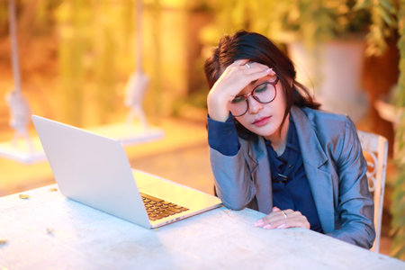 beautiful businesswoman with glasses got stress and headache