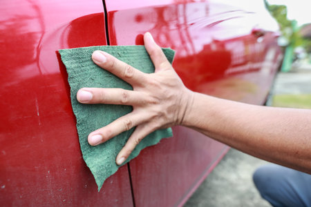 man hand cleaning car