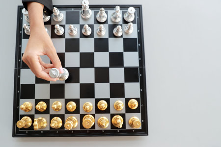 Businesswoman playing chess board game idea of management strategy and leadership concept